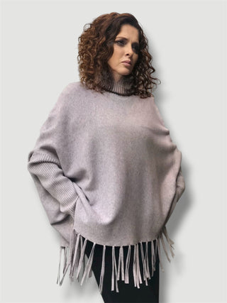 Poncho SAVINA con manga ajustada y flecos lila